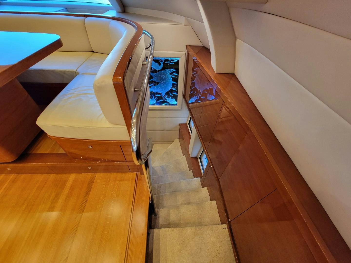 a room with a couch and a table aboard PREDATOR Yacht for Sale