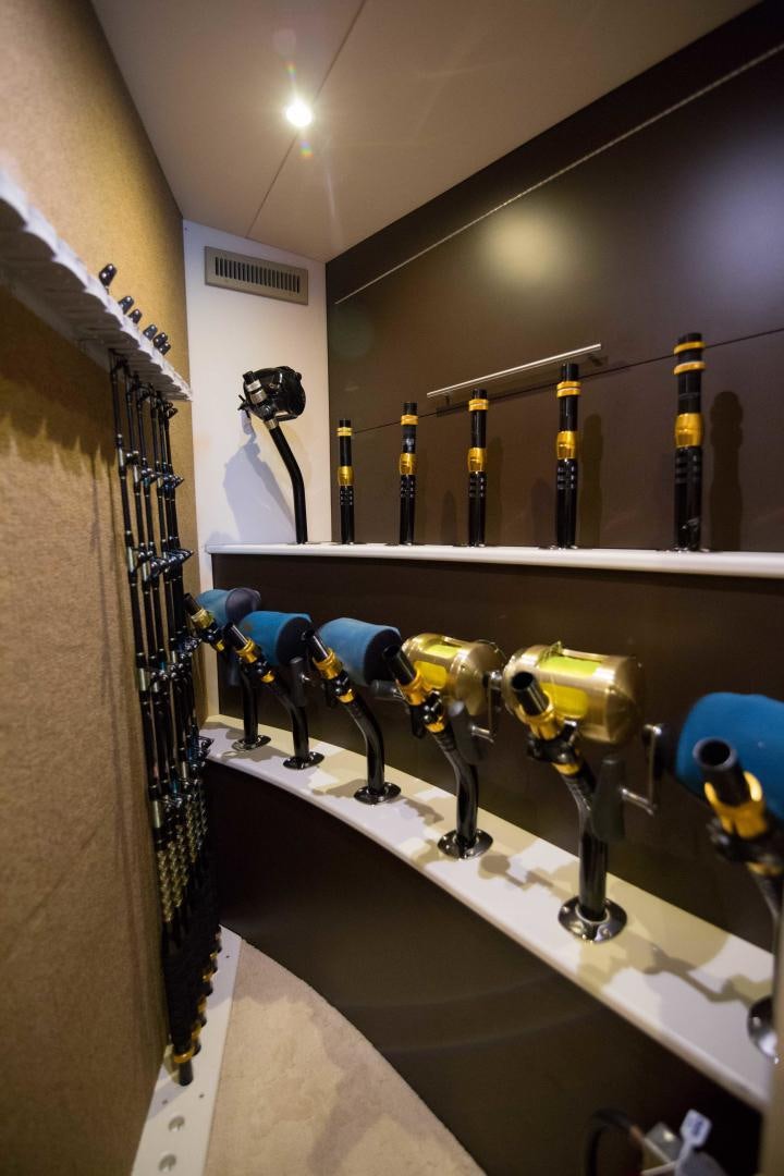 a group of toy figures on a shelf aboard PREDATOR Yacht for Sale