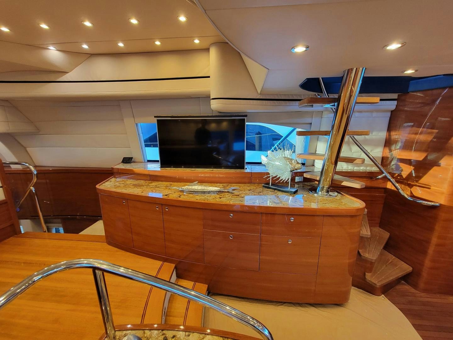 a room with a large tv and a slide aboard PREDATOR Yacht for Sale