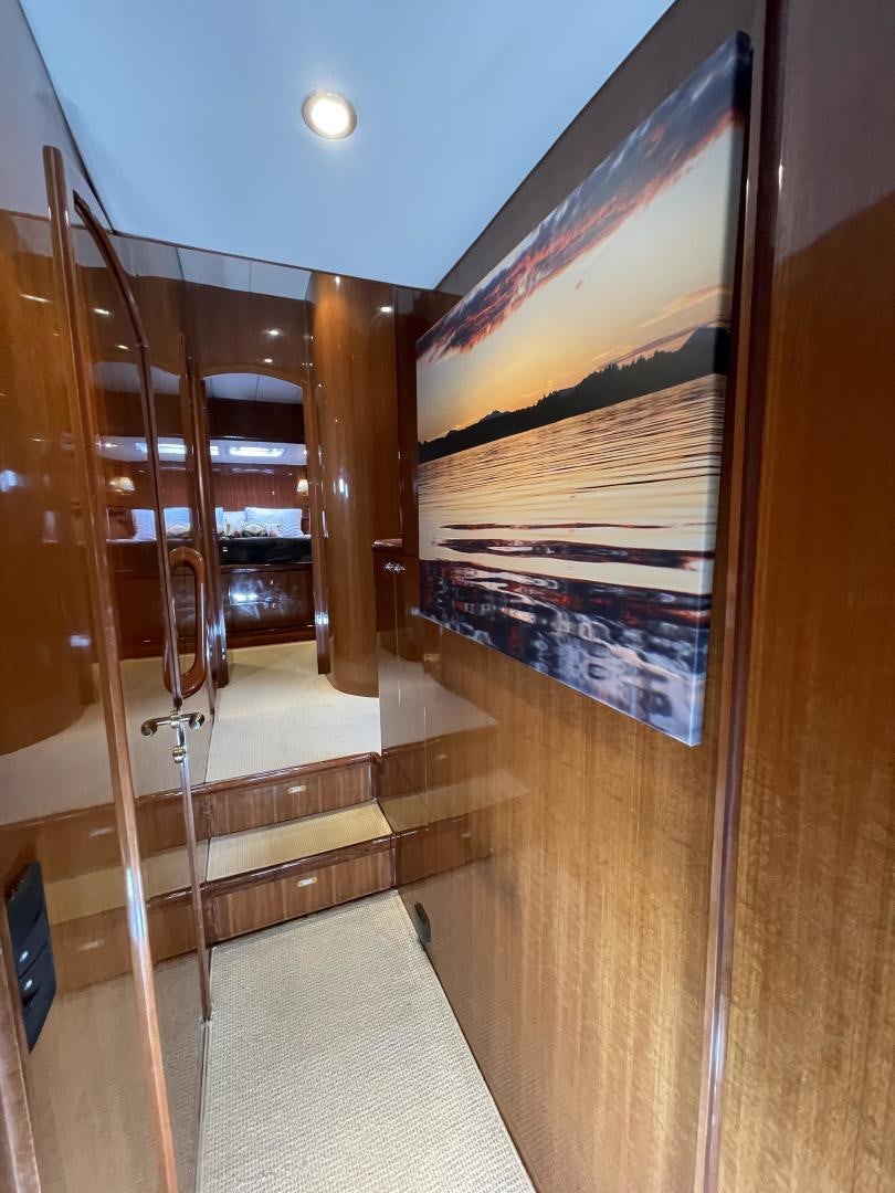 a room with a glass door aboard MIA & MAUI JIM Yacht for Sale