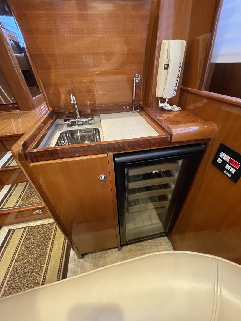 a bathroom with a sink and a mirror aboard MIA & MAUI JIM Yacht for Sale