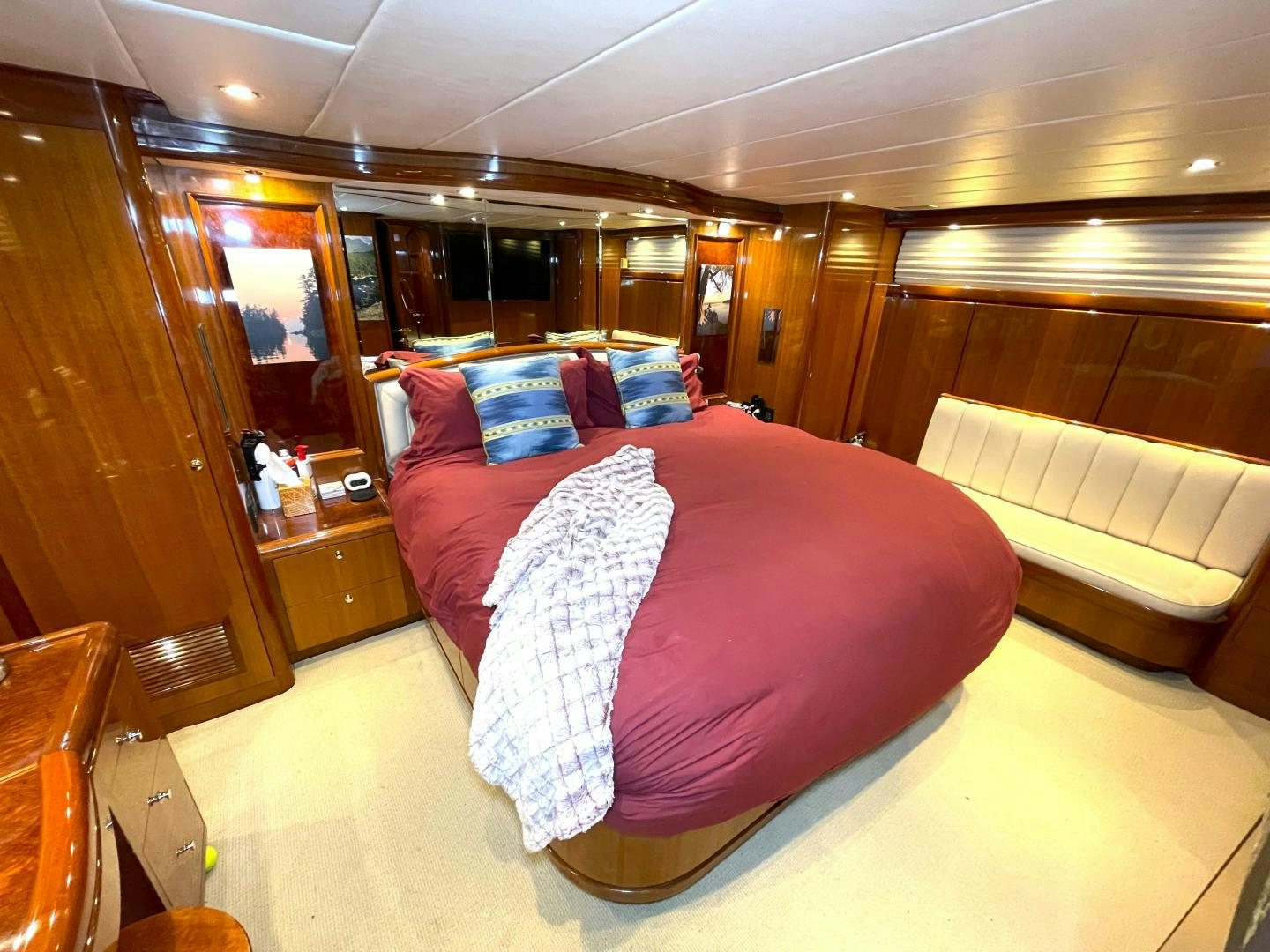 a room with a bed and a mirror aboard MIA & MAUI JIM Yacht for Sale