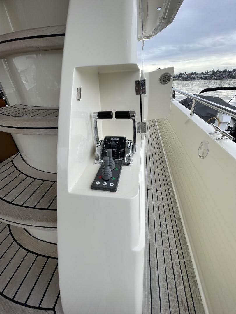 a white vehicle with a black object on the back aboard MIA & MAUI JIM Yacht for Sale