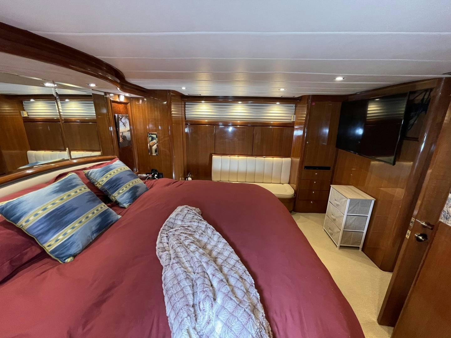 a bed in a room aboard MIA & MAUI JIM Yacht for Sale