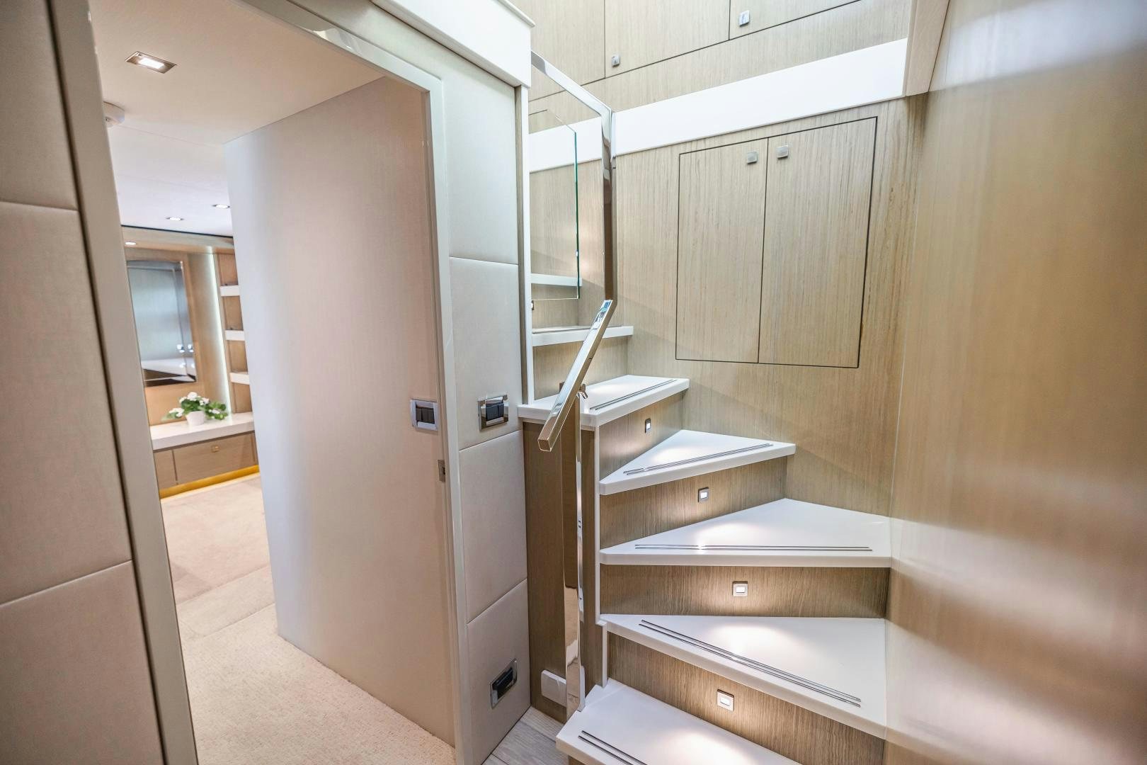 a room with wooden cabinets aboard BELLA SKY Yacht for Sale