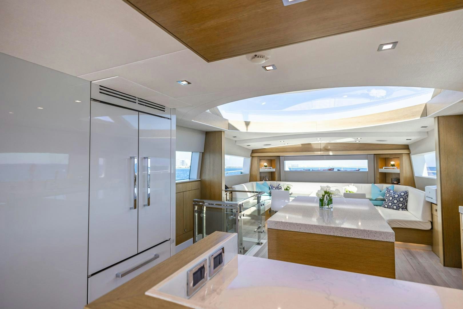 a large kitchen with a large island aboard BELLA SKY Yacht for Sale