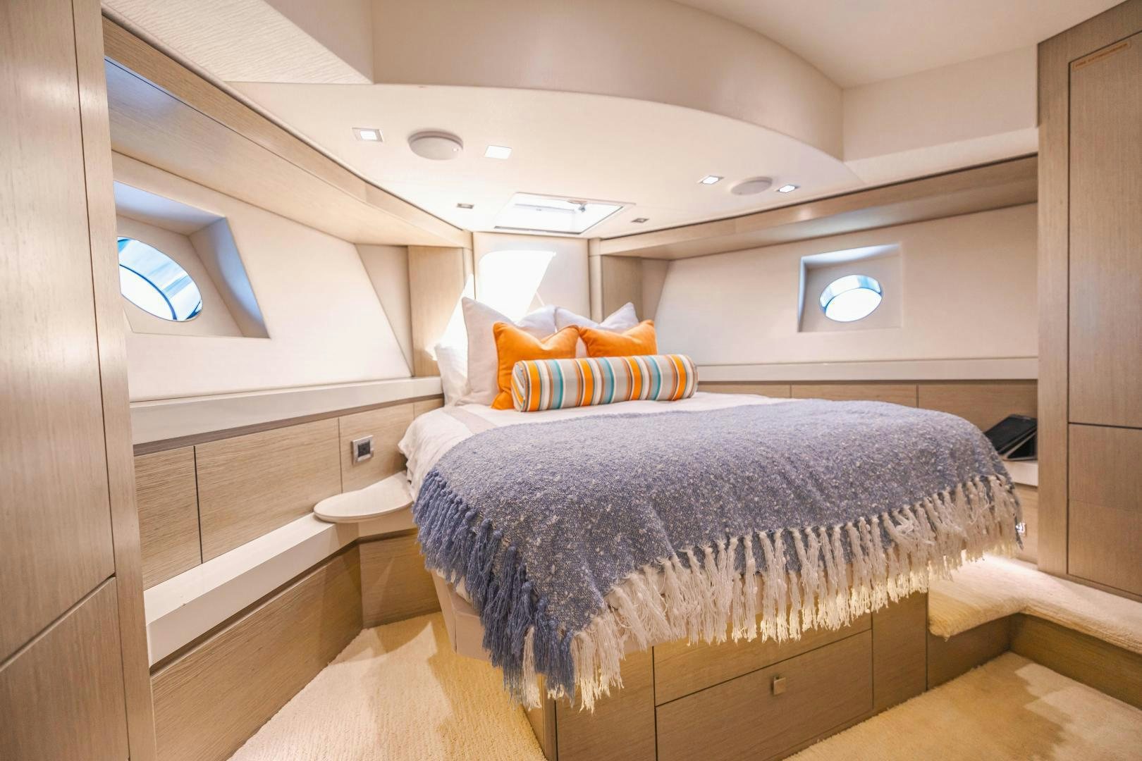 a bed in a room aboard BELLA SKY Yacht for Sale