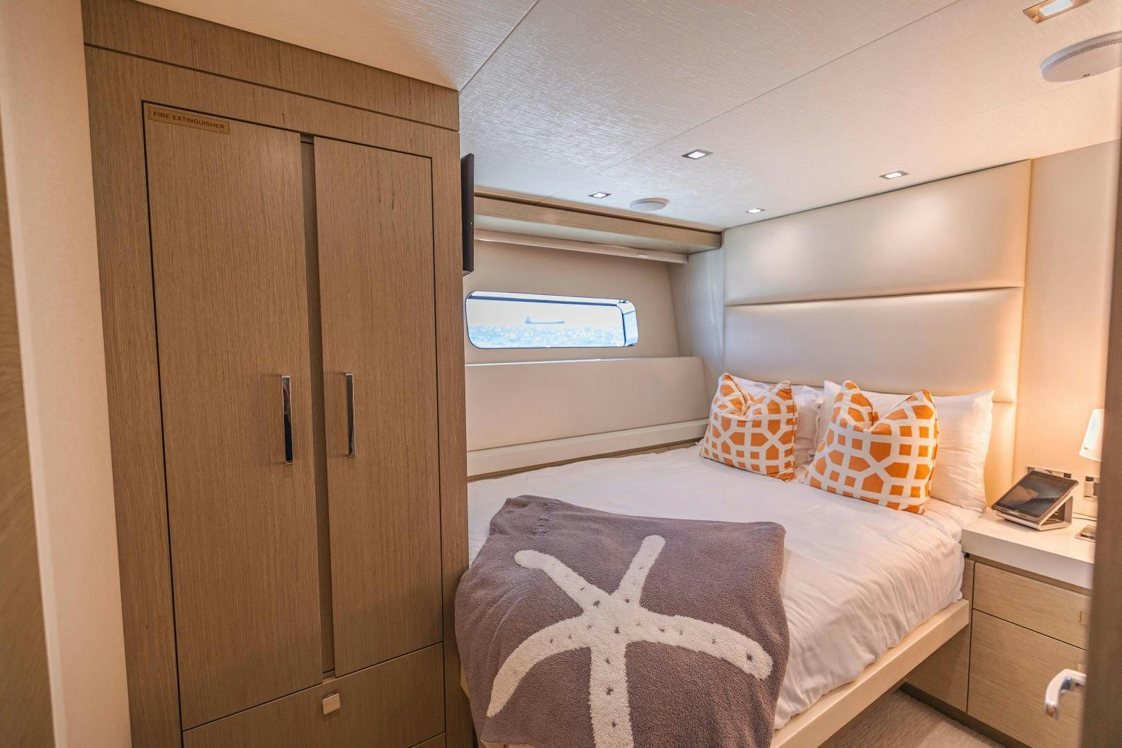 a bed with pillows on it aboard BELLA SKY Yacht for Sale