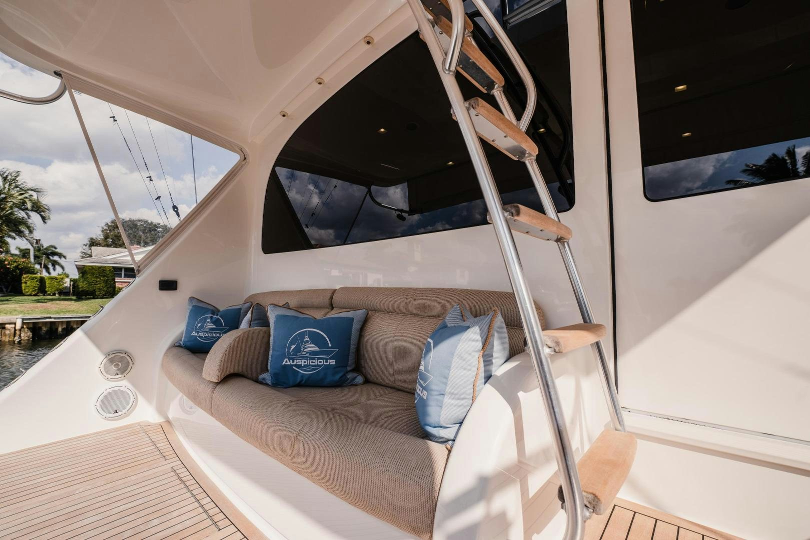 a white tent with a blue pillow on it aboard AUSPICIOUS Yacht for Sale