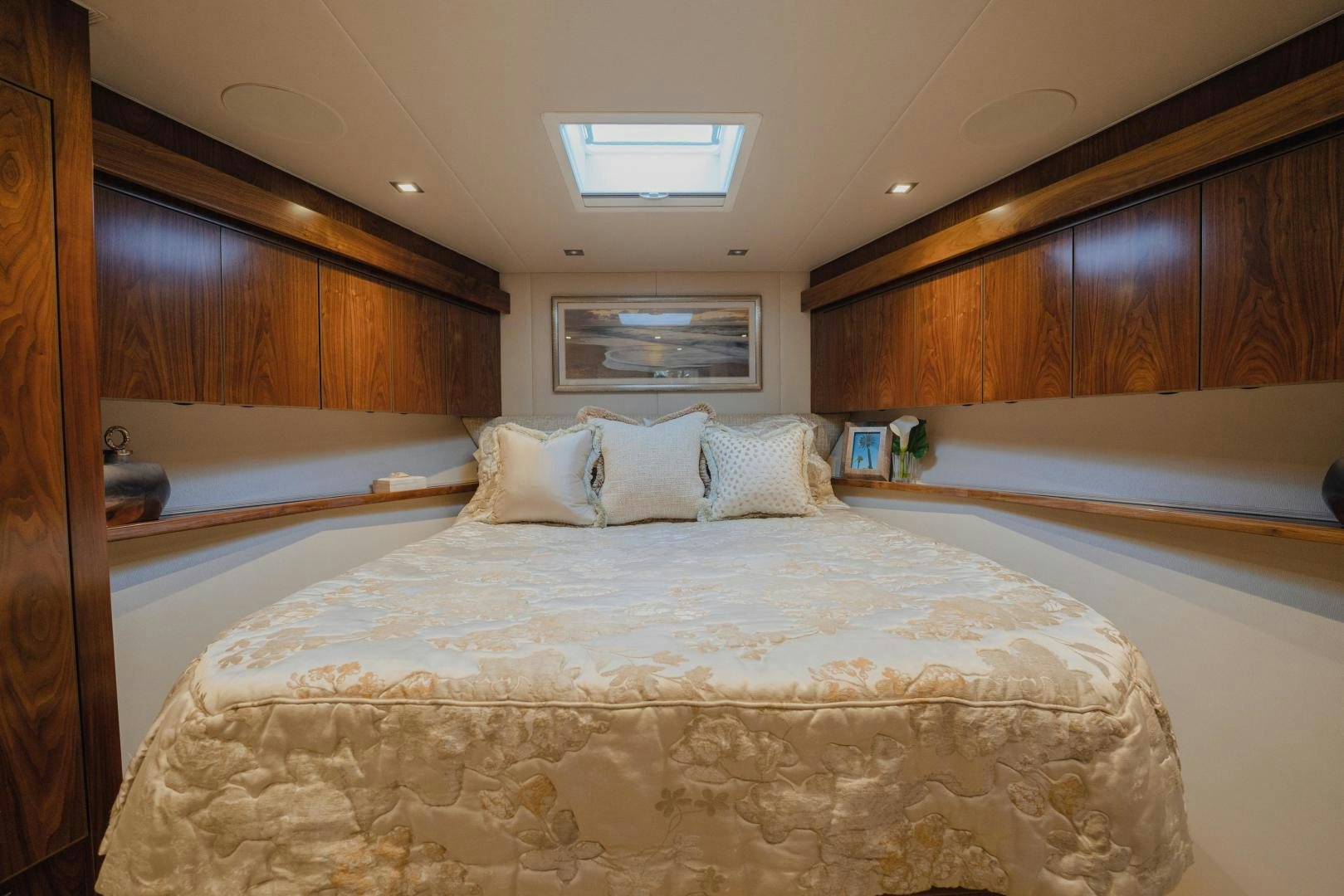 a bed with white sheets aboard AUSPICIOUS Yacht for Sale