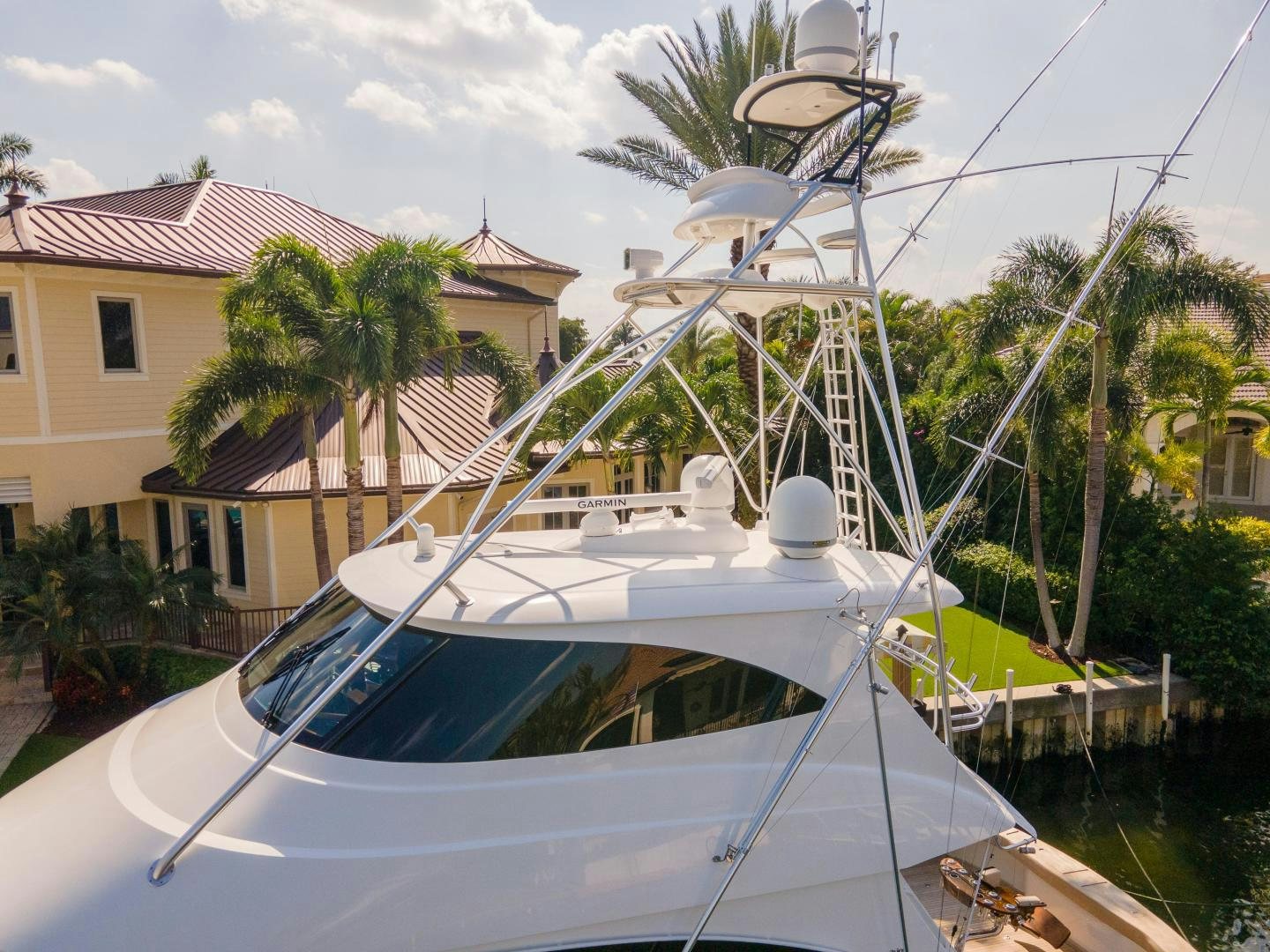 a white boat docked aboard AUSPICIOUS Yacht for Sale