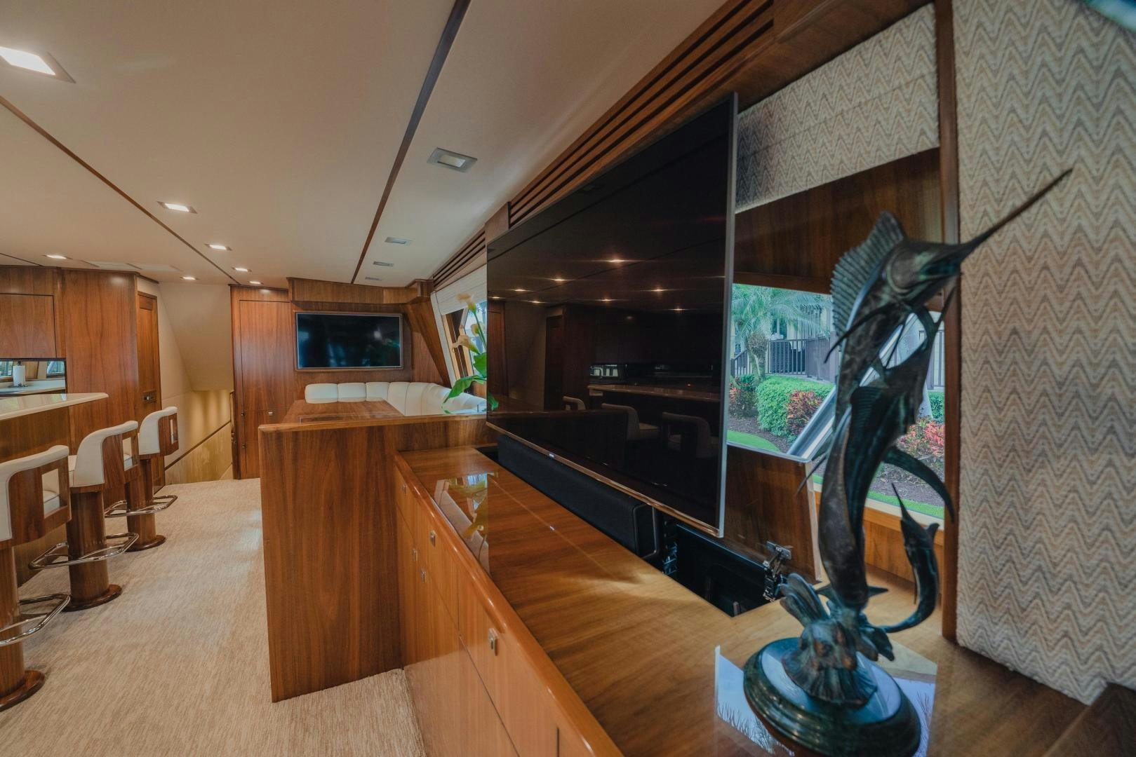 a room with a large glass display aboard AUSPICIOUS Yacht for Sale