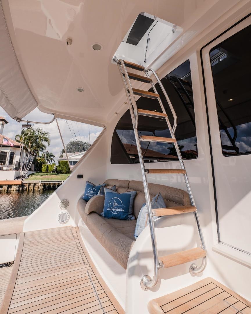 a boat with a ladder aboard AUSPICIOUS Yacht for Sale