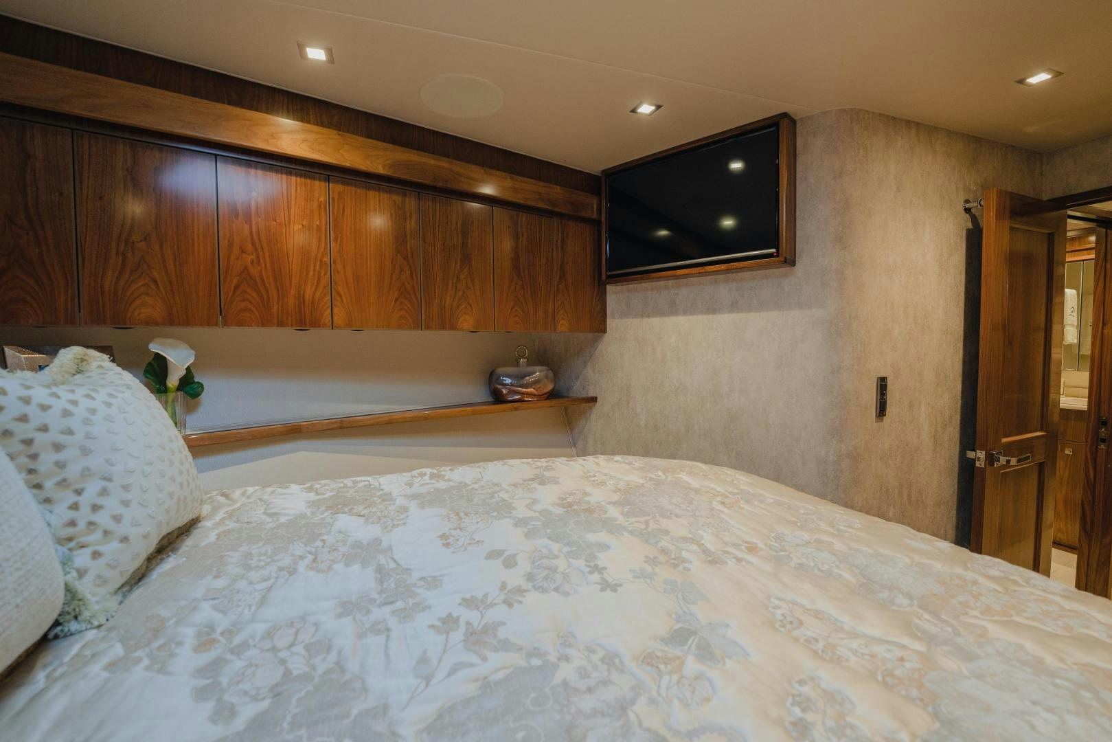 a bed with white sheets aboard AUSPICIOUS Yacht for Sale