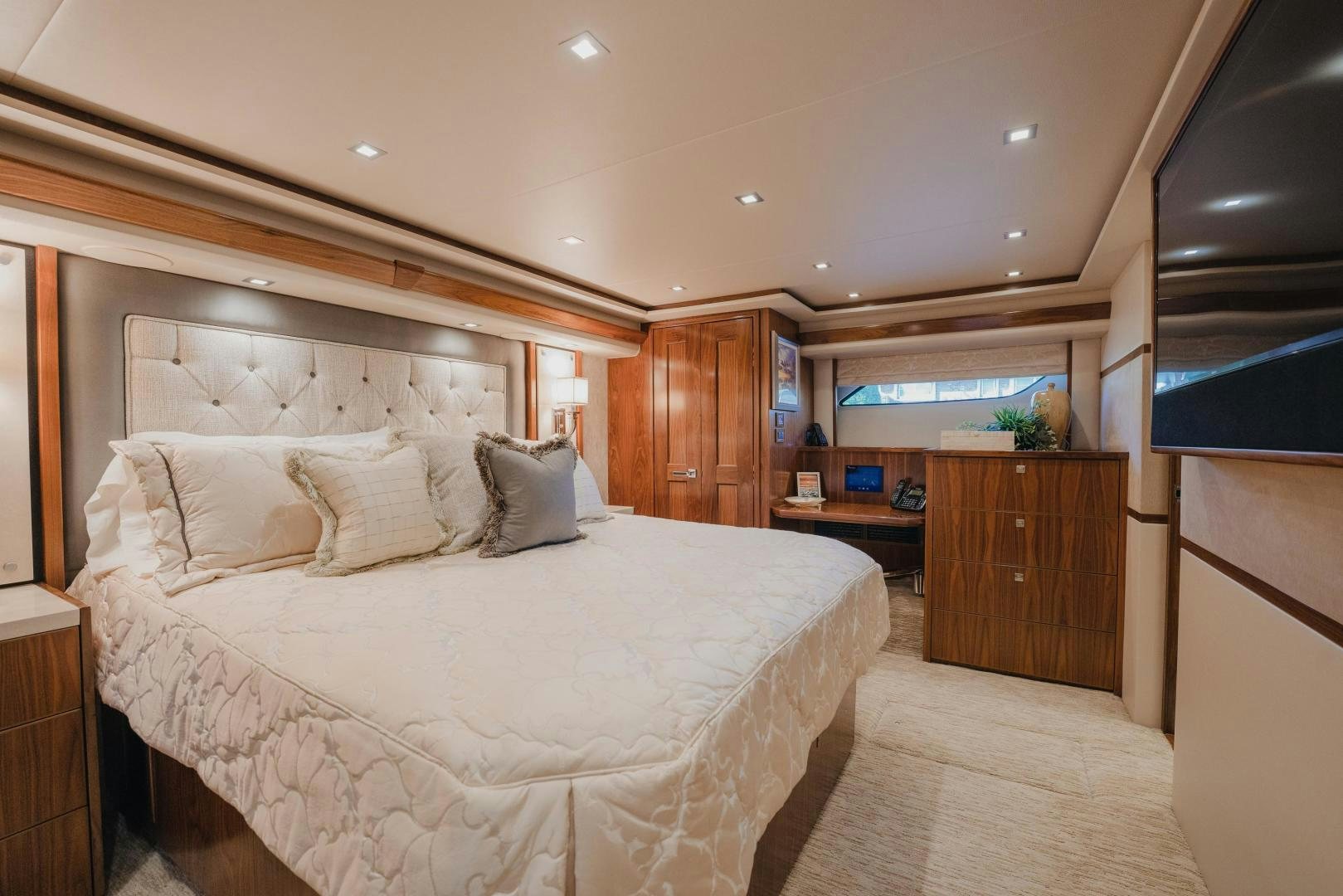 a large bed in a room aboard AUSPICIOUS Yacht for Sale