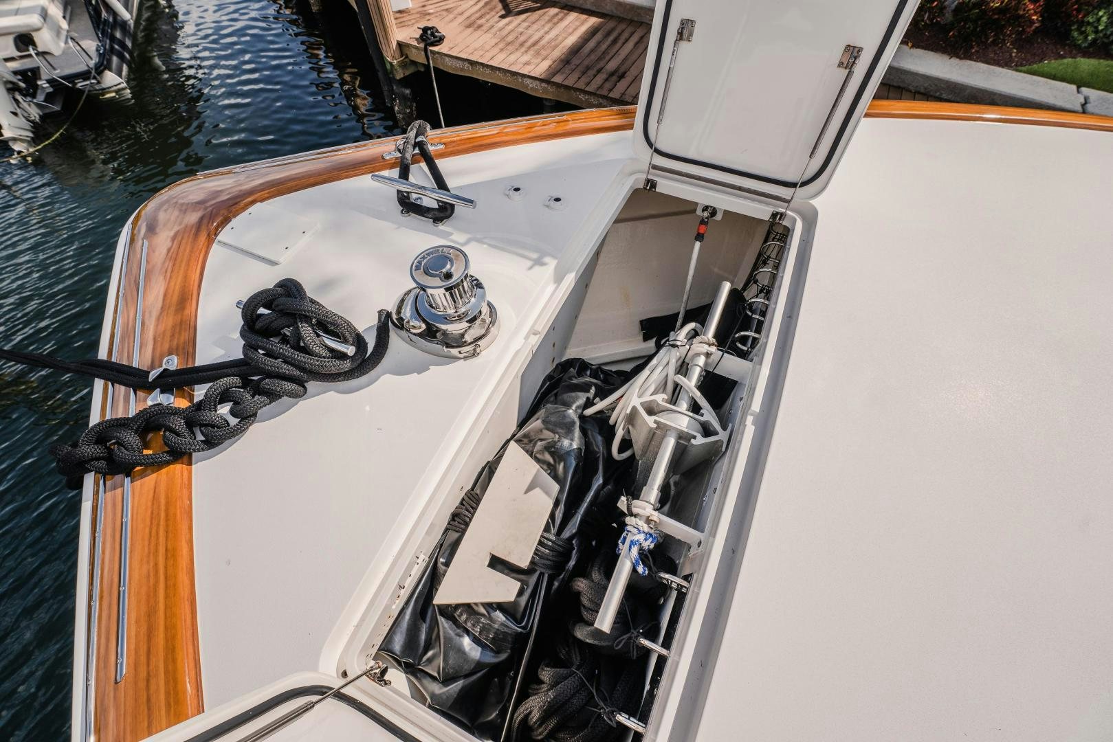 a boat with a steering wheel aboard AUSPICIOUS Yacht for Sale