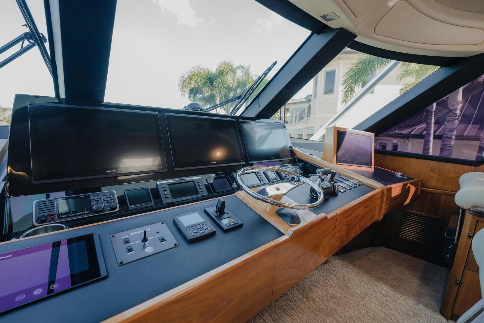 a tv on a table aboard AUSPICIOUS Yacht for Sale