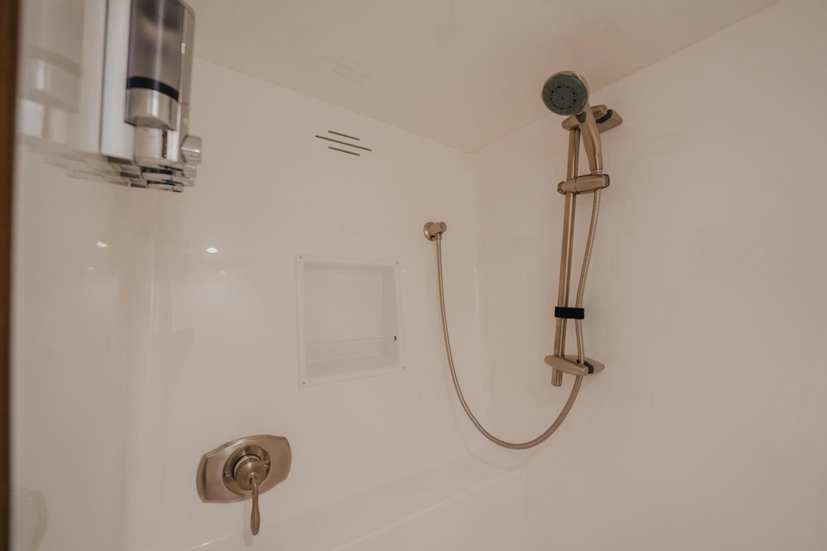 a white wall with a light fixture aboard AUSPICIOUS Yacht for Sale