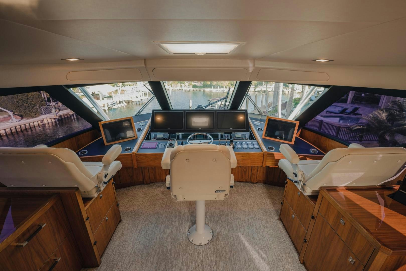 inside of a vehicle with a large window and a view of the city aboard AUSPICIOUS Yacht for Sale