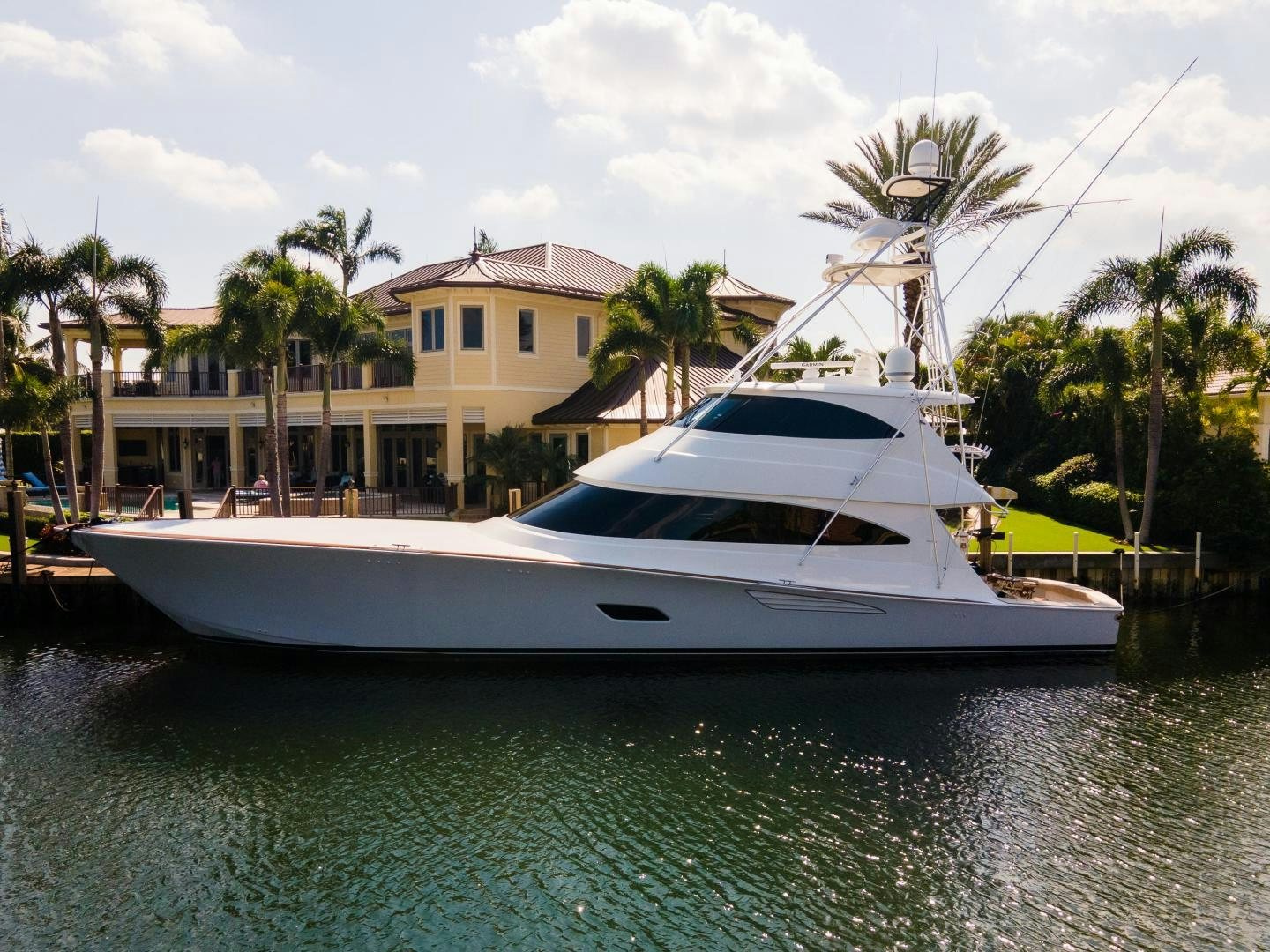 a white boat in the water aboard AUSPICIOUS Yacht for Sale