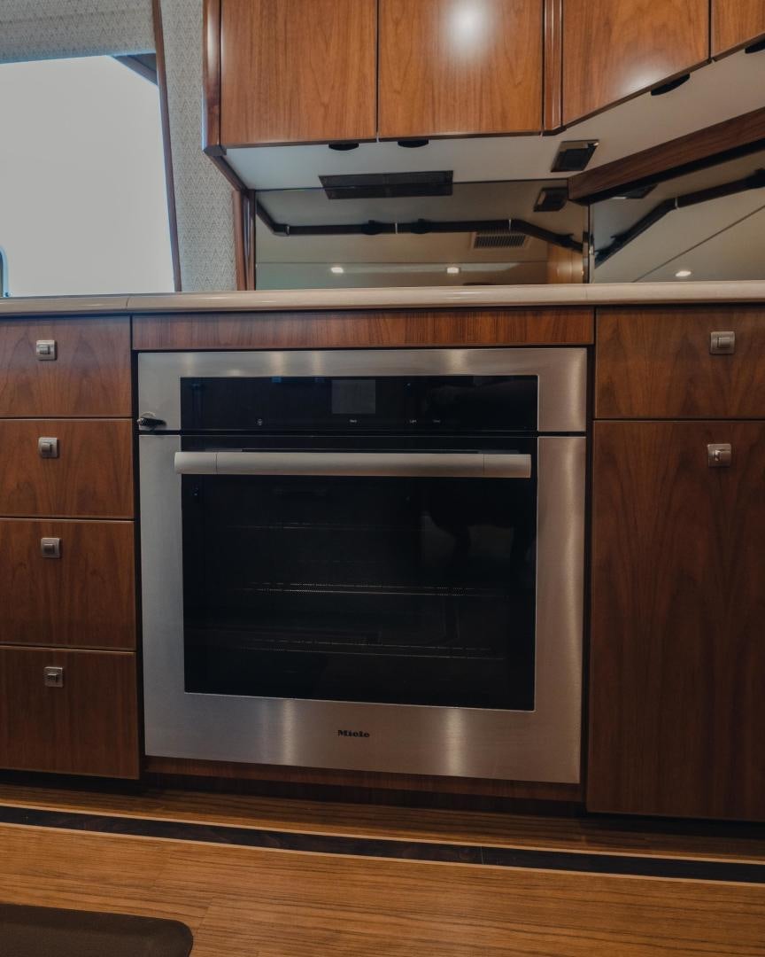 a microwave oven in a kitchen aboard AUSPICIOUS Yacht for Sale
