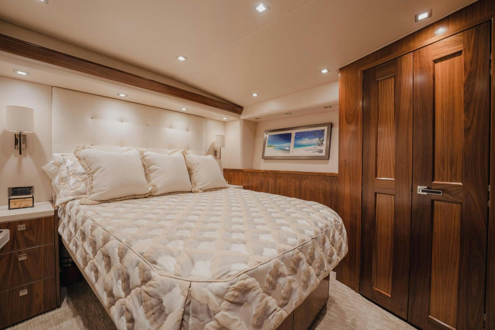 a bed with a white sheet aboard AUSPICIOUS Yacht for Sale