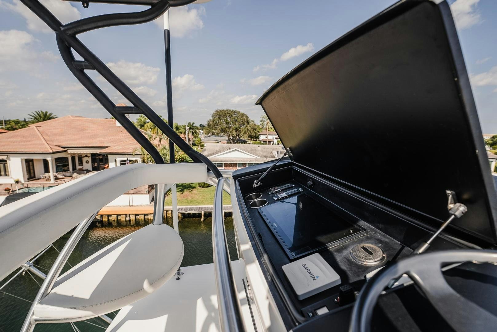 a steering wheel and dashboard of a car aboard AUSPICIOUS Yacht for Sale