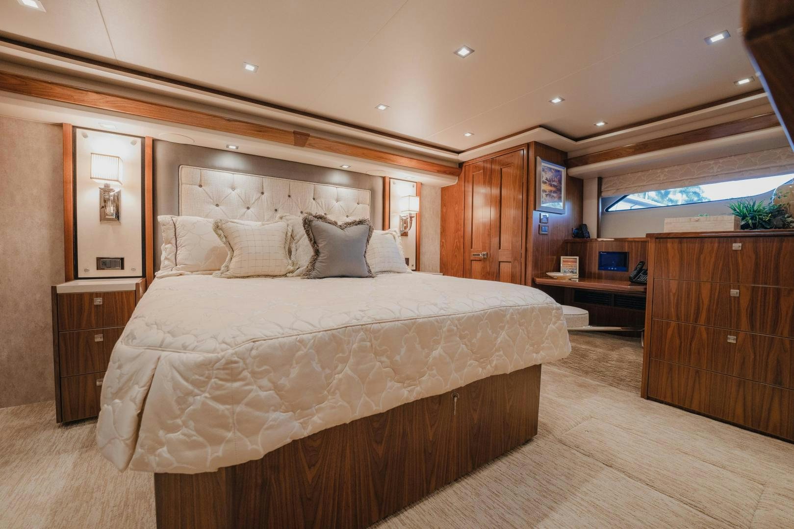 a large bed in a room aboard AUSPICIOUS Yacht for Sale
