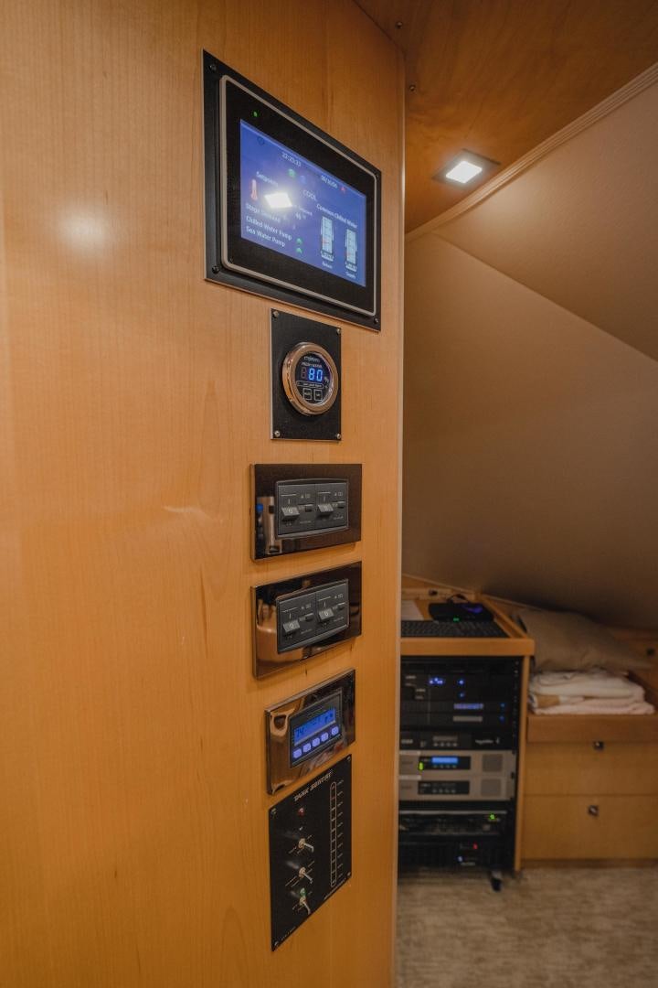 a tv on a wall aboard AUSPICIOUS Yacht for Sale