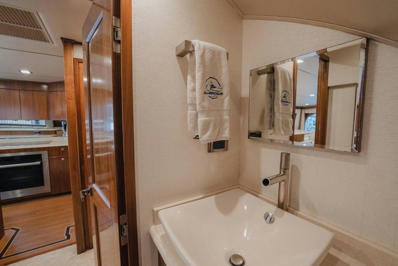 a bathroom with a bathtub and sink aboard AUSPICIOUS Yacht for Sale