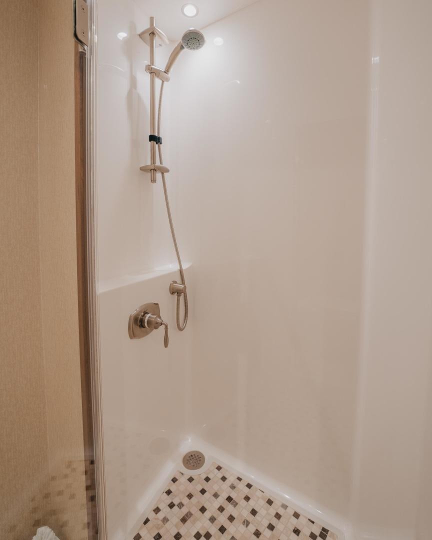 a shower with a shower head aboard AUSPICIOUS Yacht for Sale