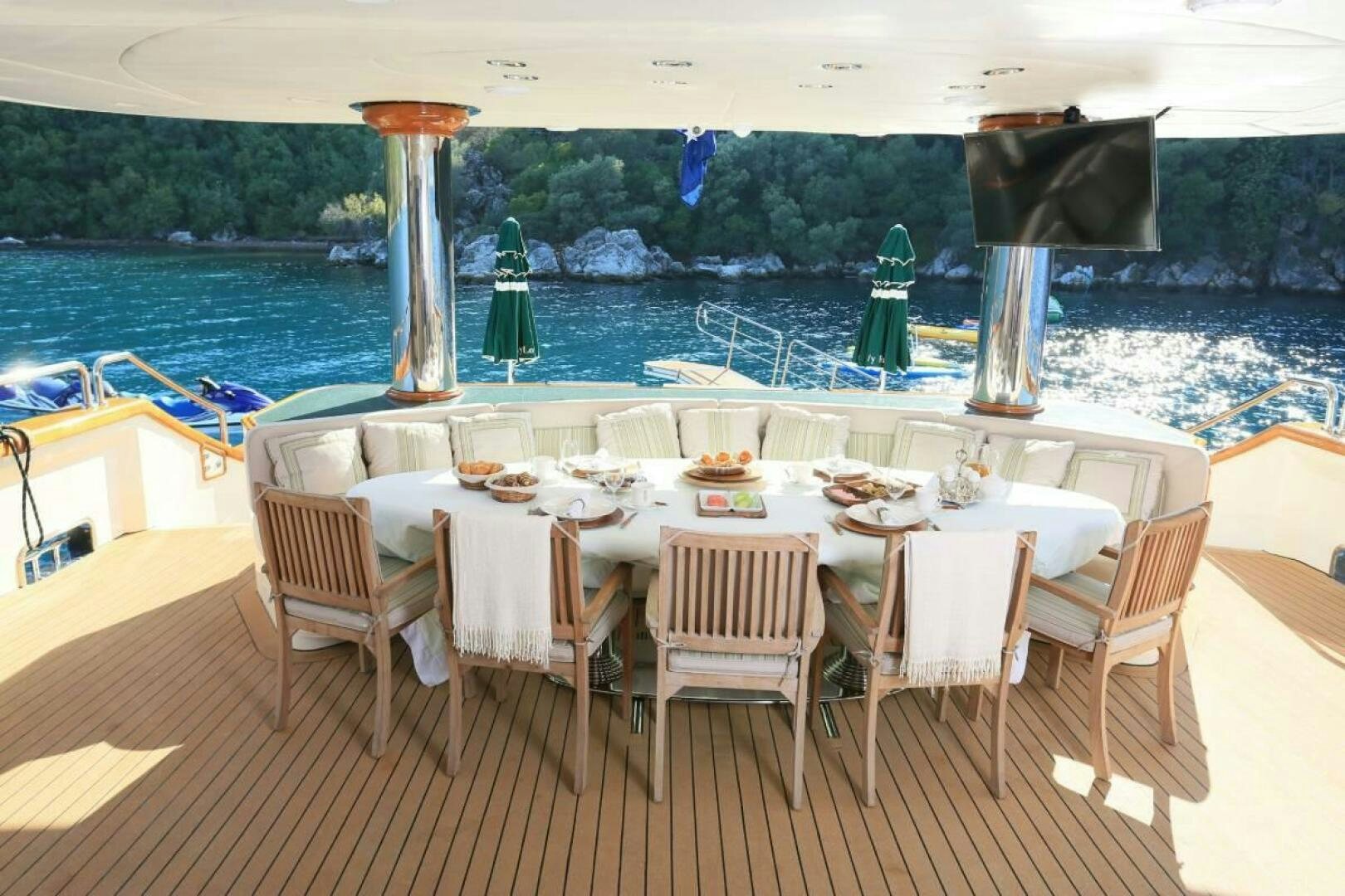 a table set for a dinner party aboard FORTY LOVE Yacht for Sale
