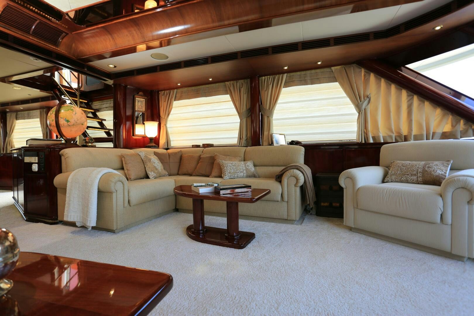a living room with a couch and a table aboard FORTY LOVE Yacht for Sale