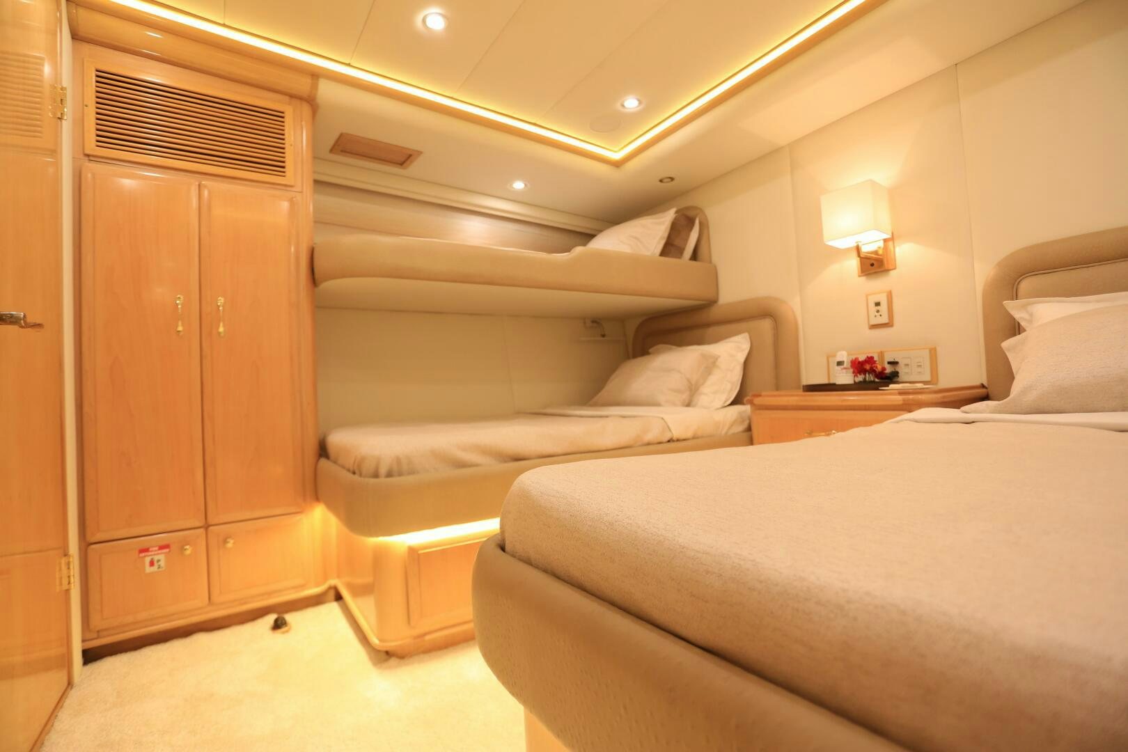 a room with a bed and a desk aboard FORTY LOVE Yacht for Sale