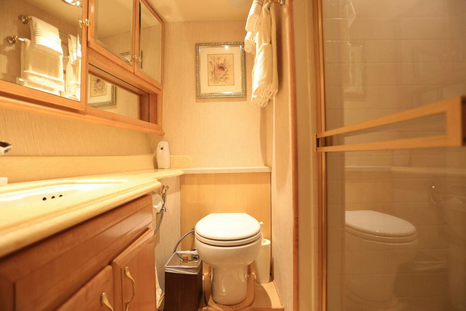 a bathroom with a toilet and sink aboard FORTY LOVE Yacht for Sale