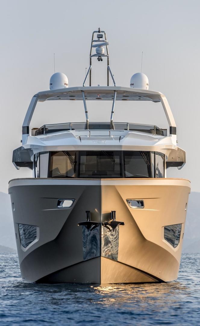 a boat with a light bulb on the front aboard 26XP HULL 24 Yacht for Sale