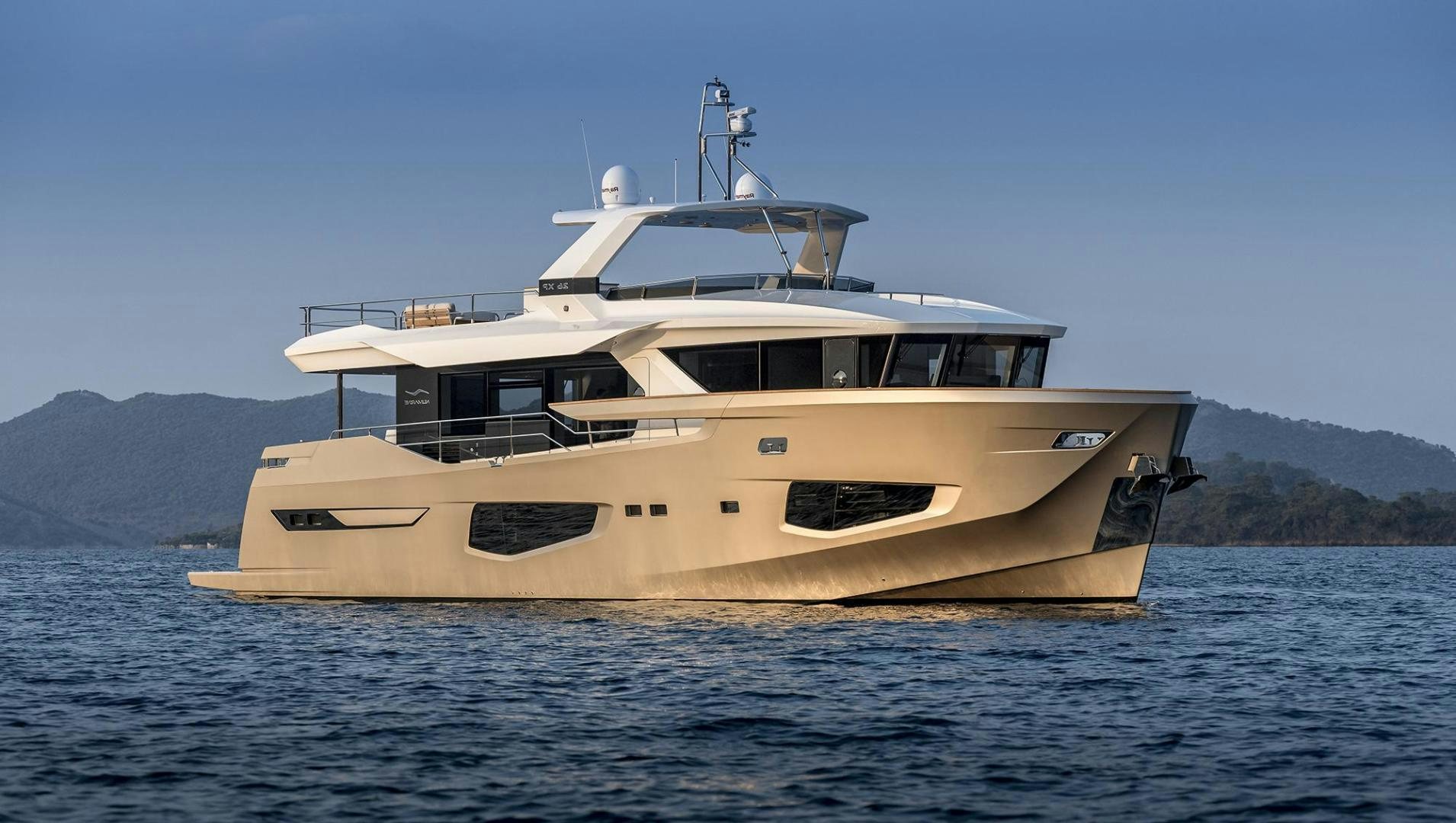 a boat on the water aboard 26XP HULL 24 Yacht for Sale