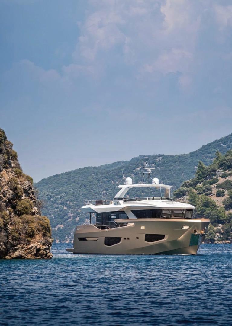 a boat on the water aboard 26XP HULL 24 Yacht for Sale