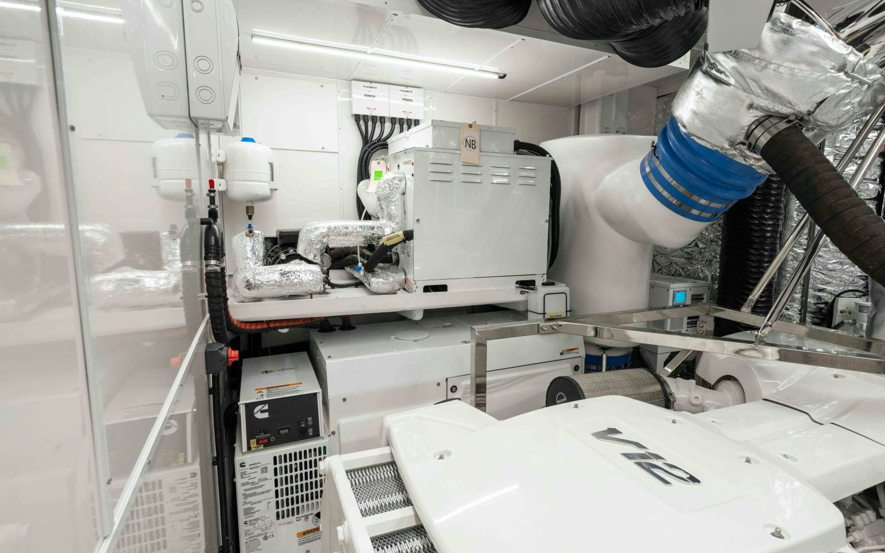 a person in a white lab coat aboard C3 Yacht for Sale