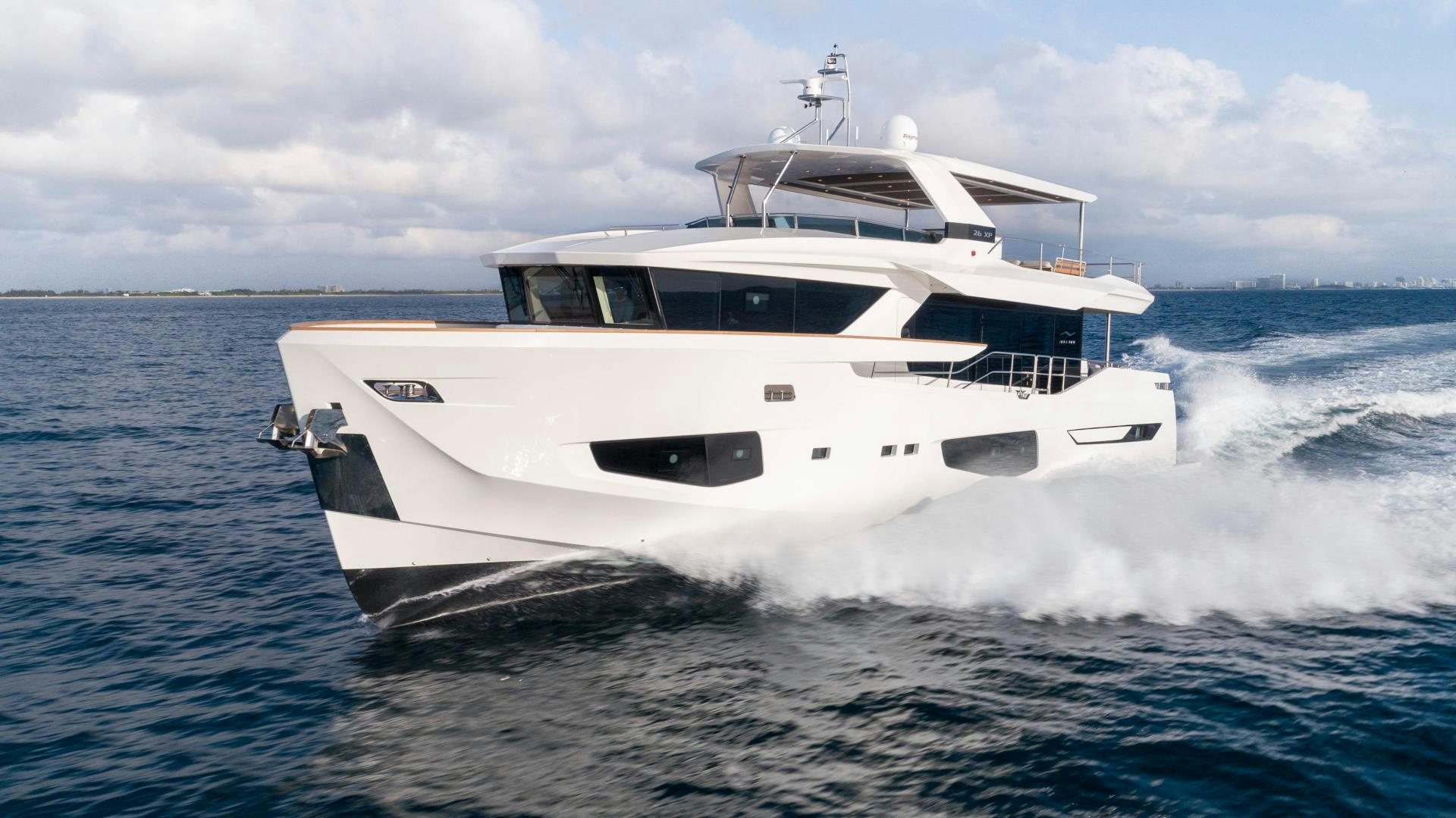 a white yacht on the water aboard C3 Yacht for Sale