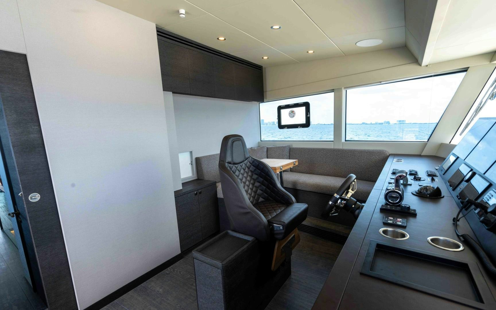 a room with a desk and a chair aboard C3 Yacht for Sale