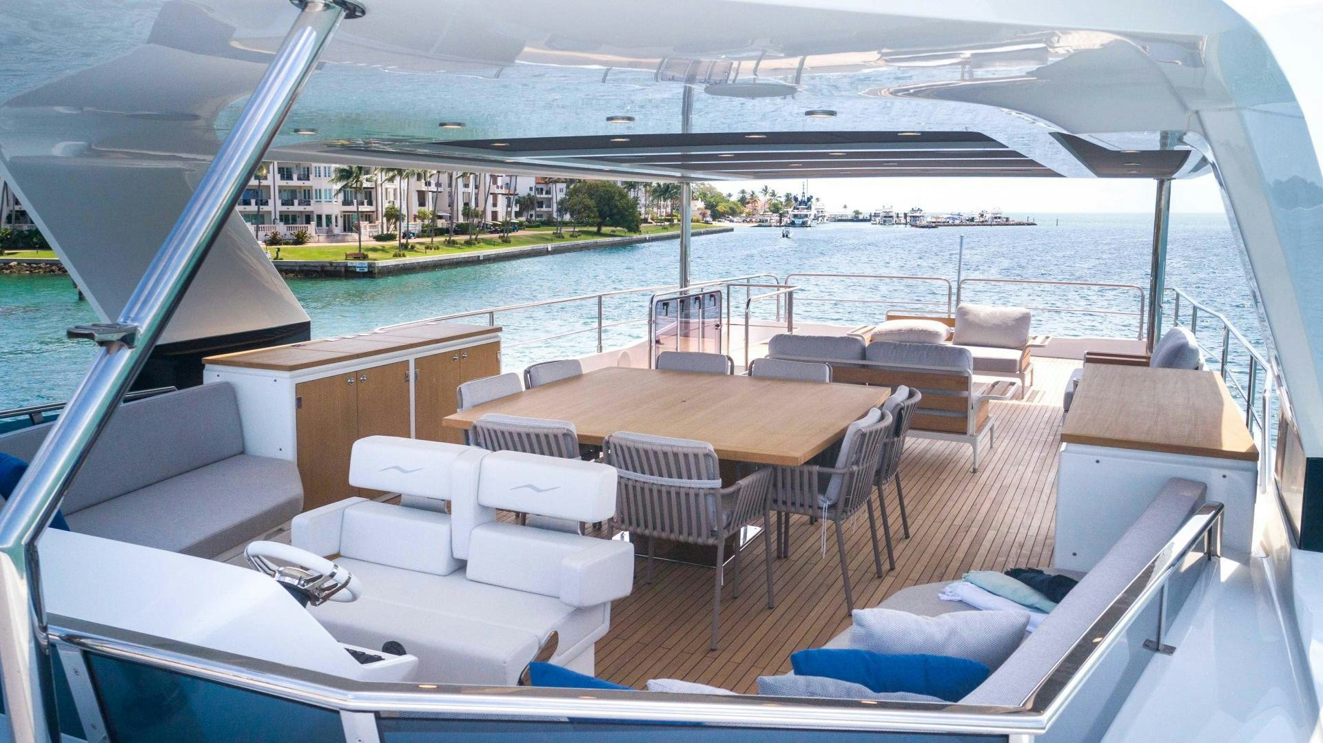 a boat with a table and chairs on it aboard C3 Yacht for Sale