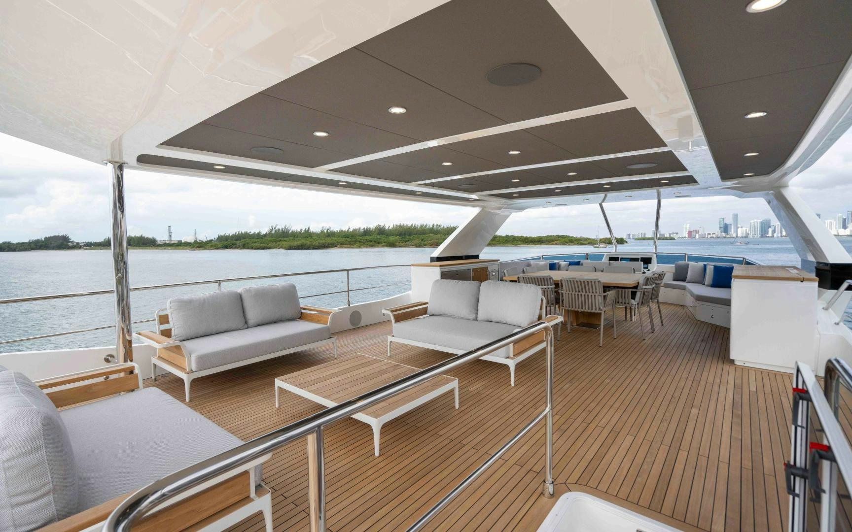 a living room with a large pool aboard C3 Yacht for Sale