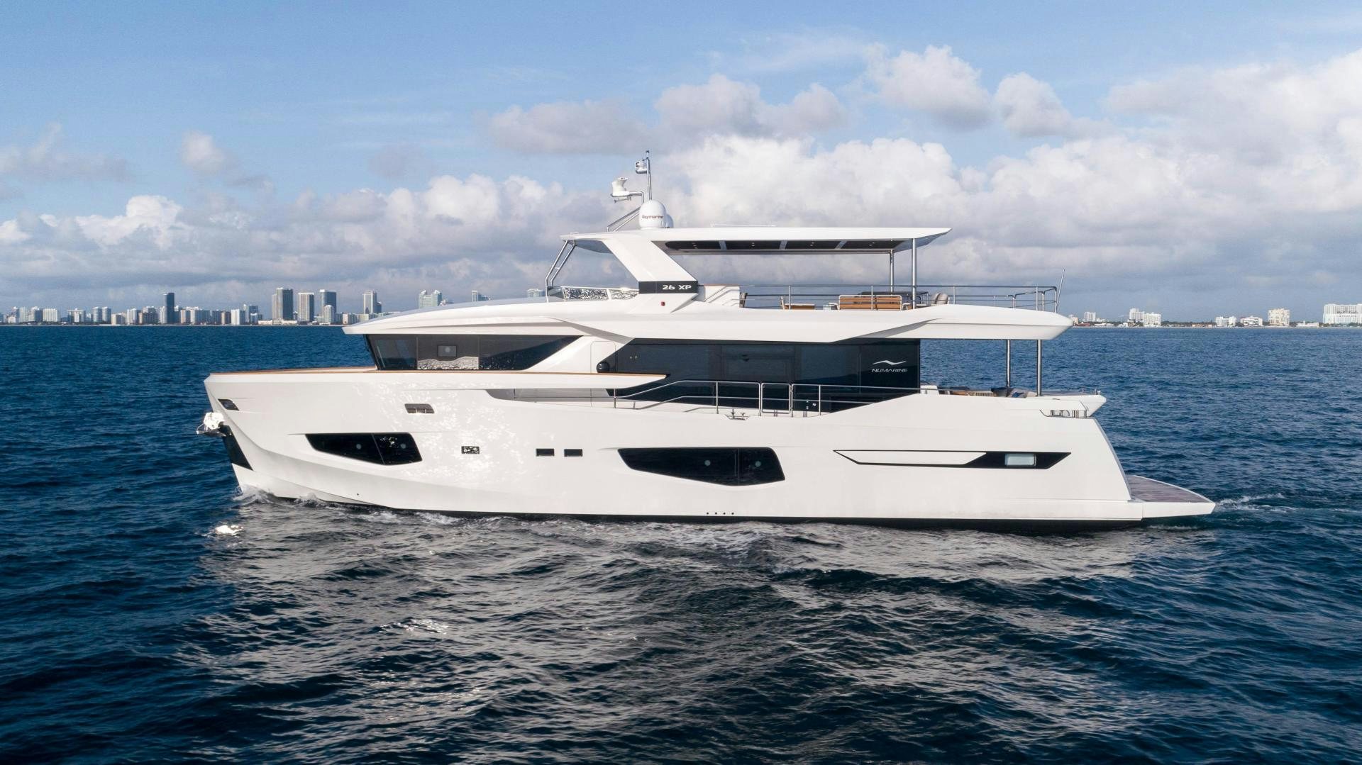 a white yacht in the water aboard C3 Yacht for Sale