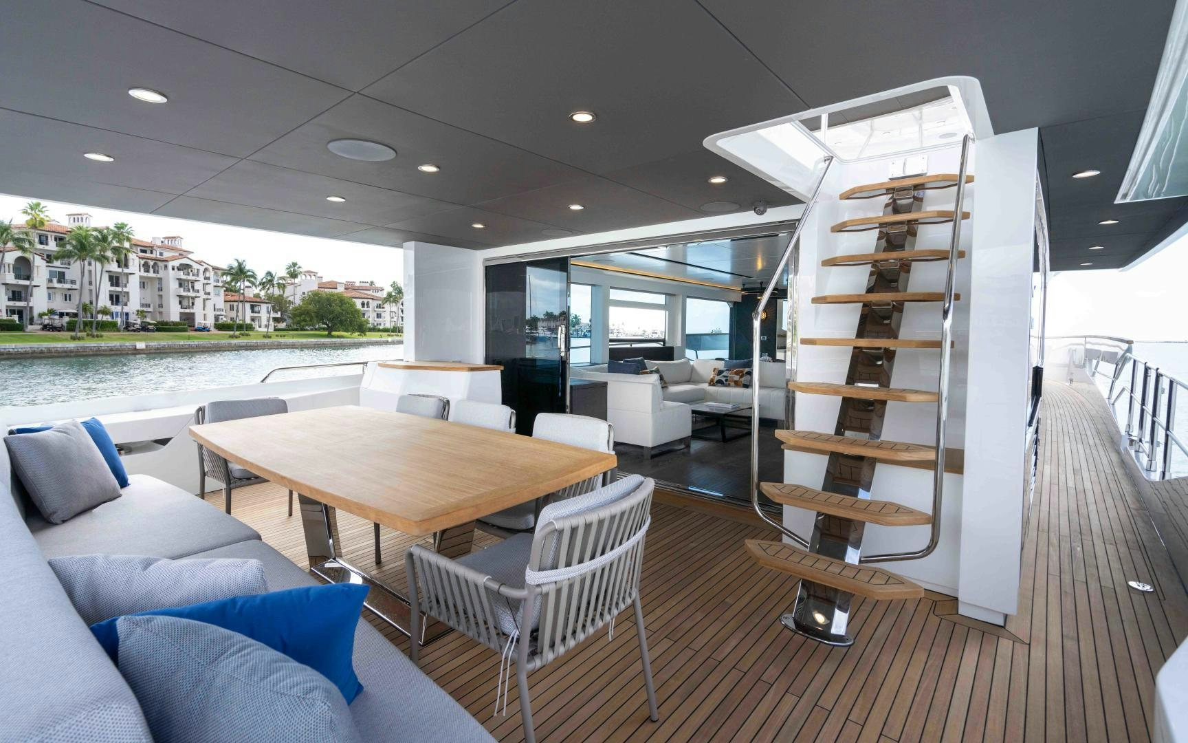 a room with a table chairs and a large window aboard C3 Yacht for Sale