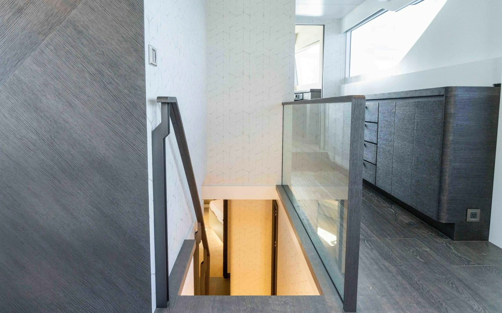 a room with a wood floor and a wood door aboard C3 Yacht for Sale