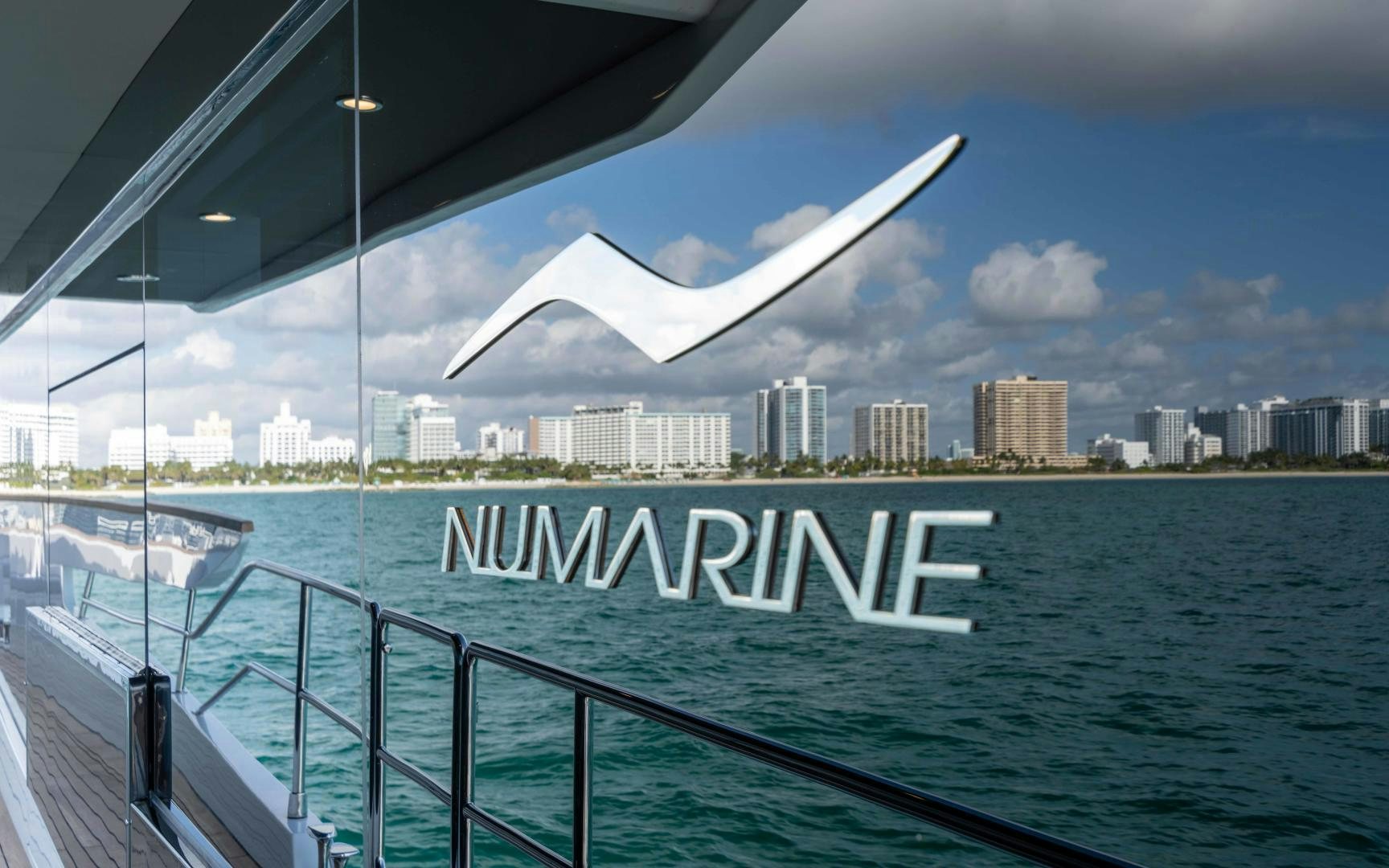 a large white sign over a body of water aboard C3 Yacht for Sale