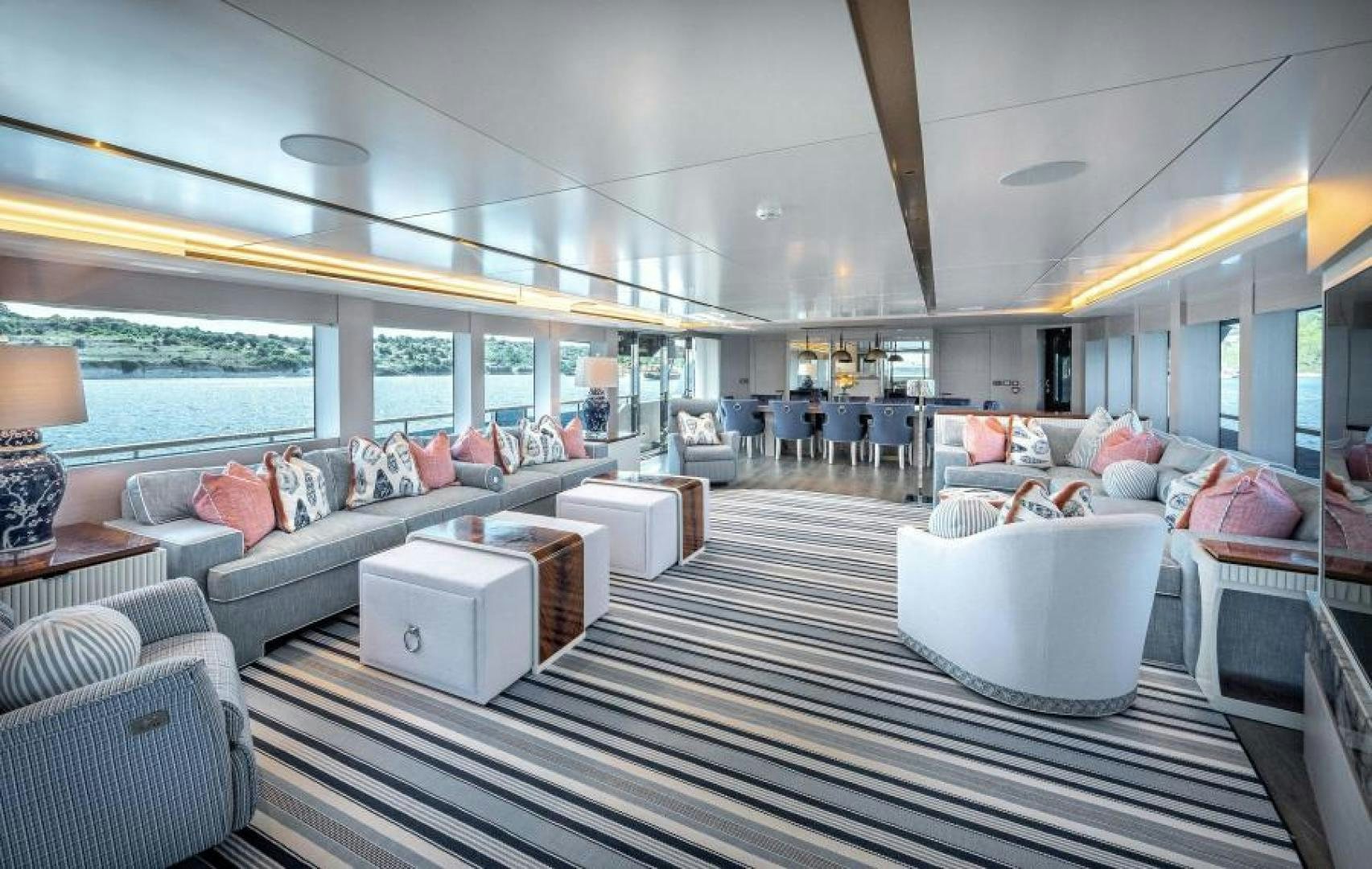 a large living room with a large window aboard NUMARINE 37XP 17 Yacht for Sale