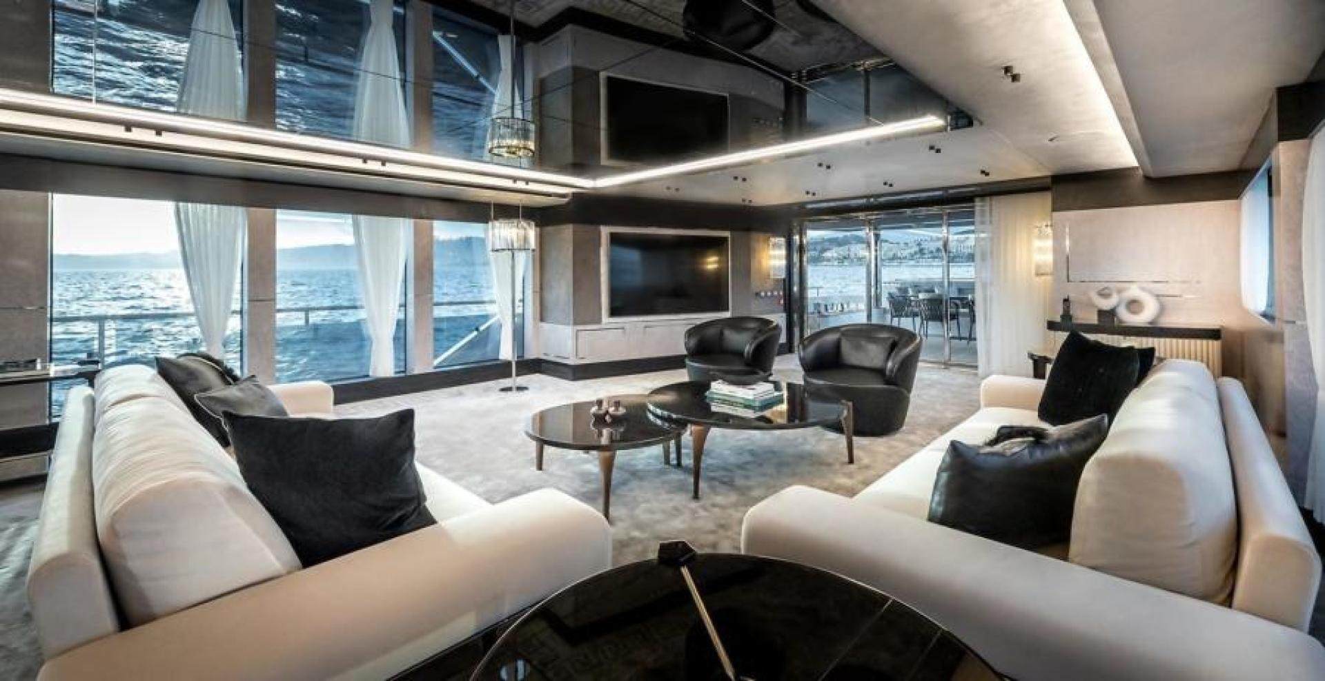 a living room with a large window aboard NUMARINE 37XP 17 Yacht for Sale