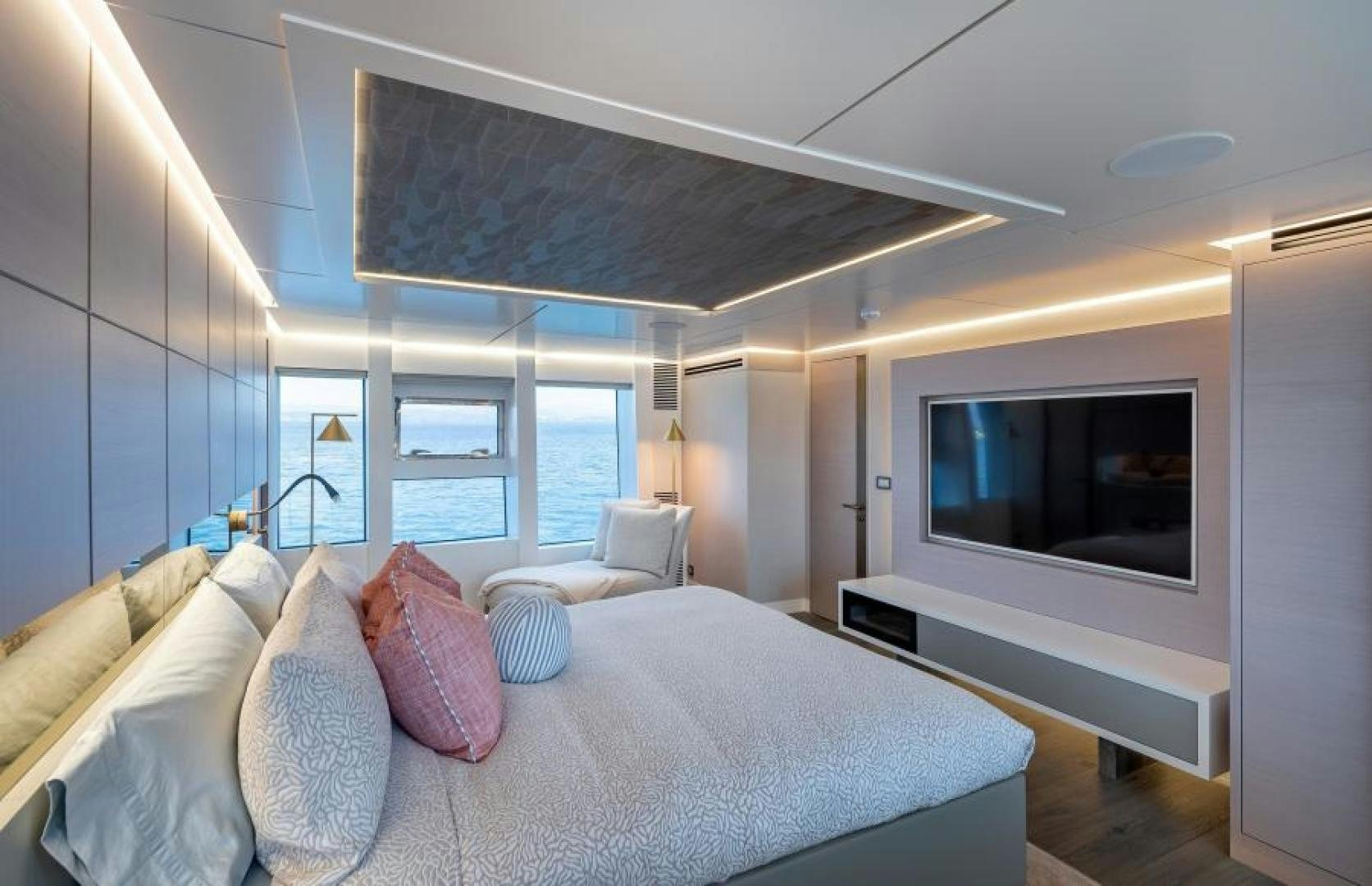 a large bed in a room aboard NUMARINE 37XP 17 Yacht for Sale